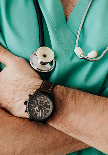 Doctor in scrubs with stethoscope