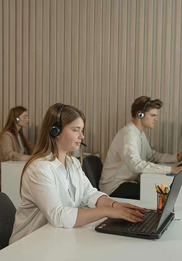Employees working in a call center office