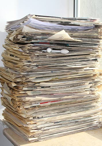 Stack of old paper records